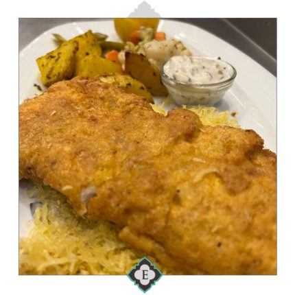Fresh marinated Lion fish from Persian Gulf marinated in saffron made crispy with bread crumbs served with Tartar sauce and sides