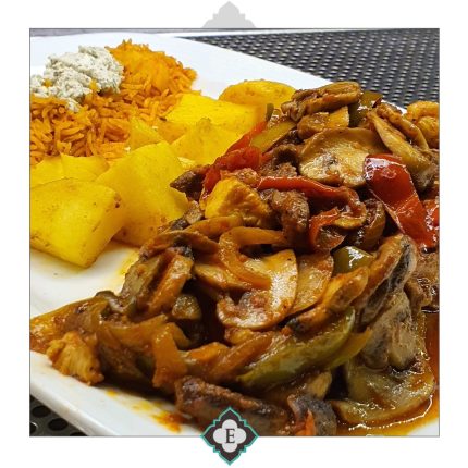 Grilled stripes of marinated chicken and beef fillet, served with fresh grilled vegetables in spicy tomato sauce and Mexican rice on cast iron