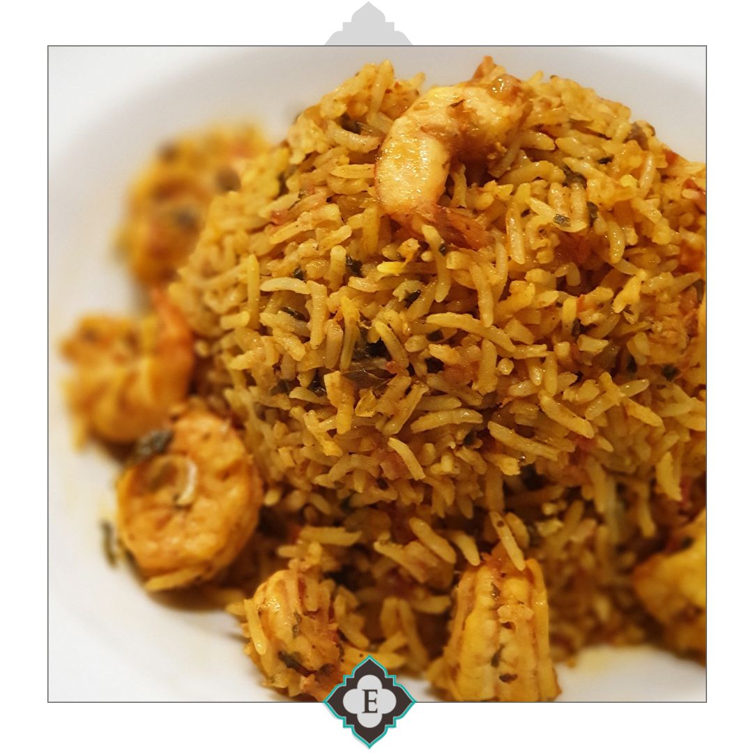 Majbous Fresh marinated shrimp in Arabic spices sautéed in butter and mixed with rice and tomato puree, herbs and spices.