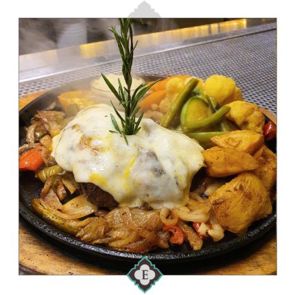 220gr of beef fillet grilled to your desire temperature topped with melted cheese, served with fresh seasonal vegetables, mushroom sauce and Mexican rice on cast iron