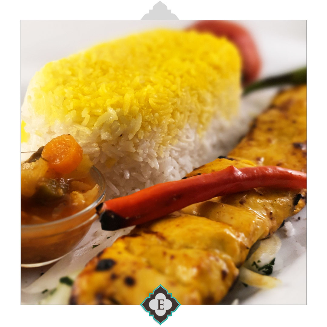 chickenkebab-marlinrestaurant Marinated chicken breast in saffron sauce, barbequed to the perfection on skewers served with barbequed tomatoes & sides