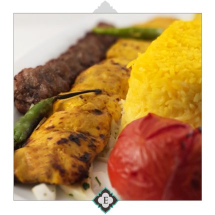 Saffron marinated barbequed chicken served with Koubide kebab, barbequed tomatoes & sides