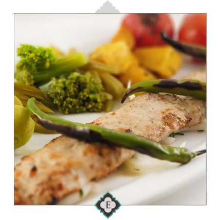 Marinated chicken breast in sour yogurt, barbequed to the perfection on skewers served with barbequed tomatoes & side